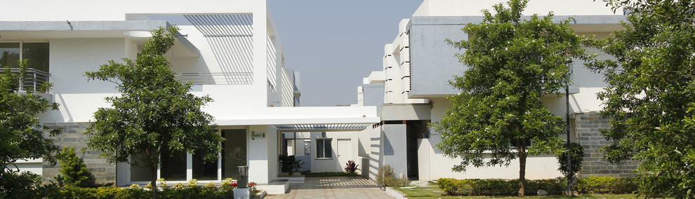Example of an asian exterior home design in Hyderabad