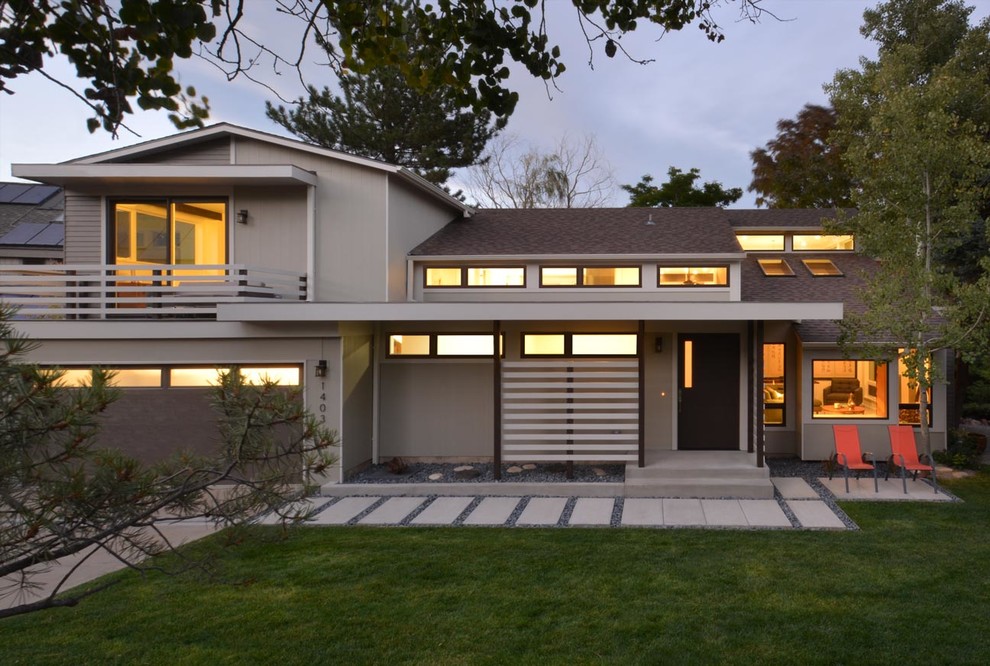 Large zen beige two-story exterior home idea in Denver
