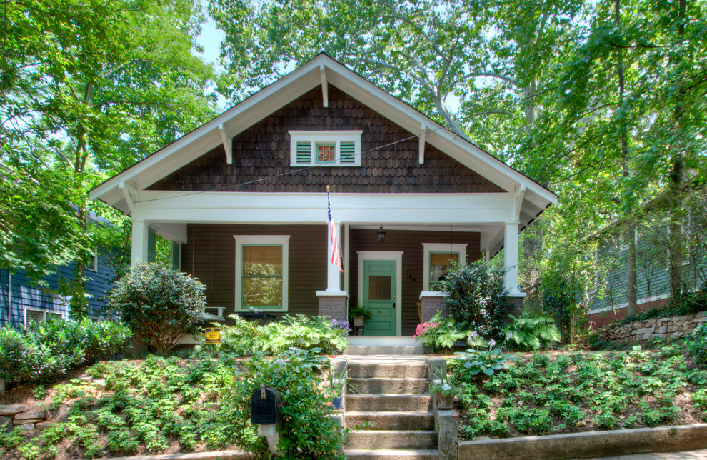 Brown traditional house exterior in Atlanta with wood cladding.