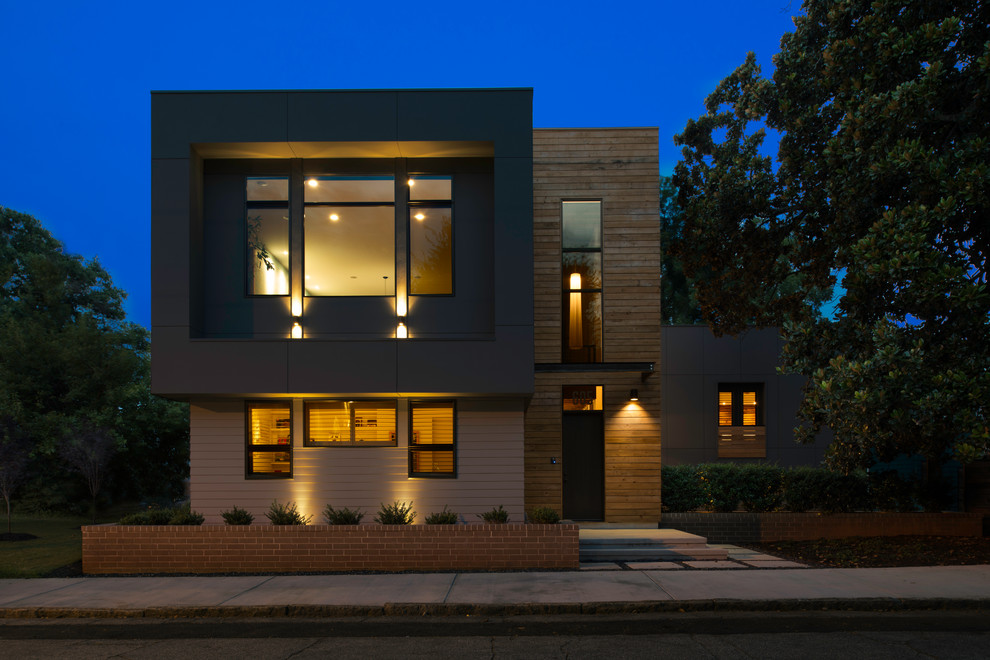 Diseño de fachada de casa beige minimalista de dos plantas con tejado plano