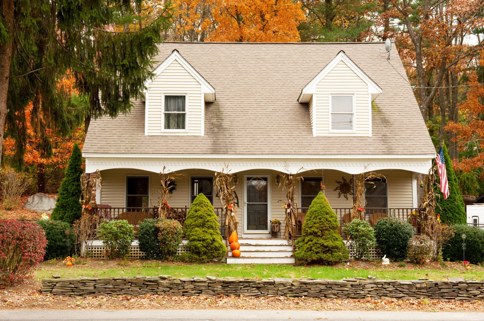Example of a small classic two-story exterior home design in Boston