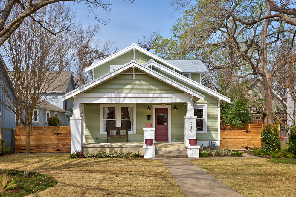 Example of a mid-sized arts and crafts two-story exterior home design in Austin