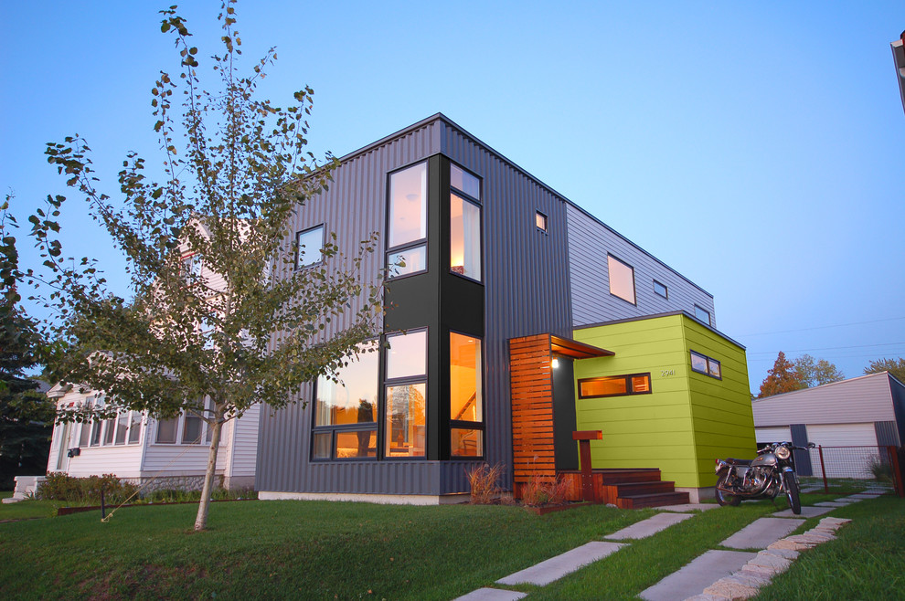 Modern blue two-story mixed siding exterior home idea in Minneapolis