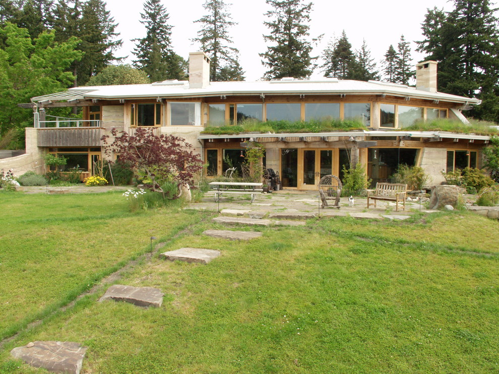 Eclectic beige two-story exterior home idea in Vancouver