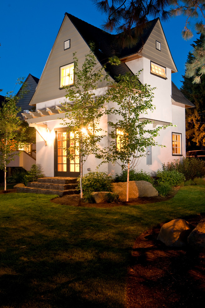 Example of a classic two-story exterior home design in Portland