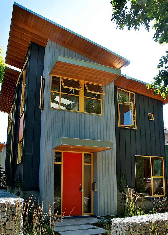 Idee per la casa con tetto a falda unica contemporaneo con rivestimento in metallo