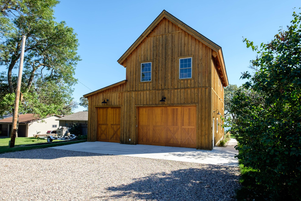 Large rustic brown two-story wood gable roof idea in Other