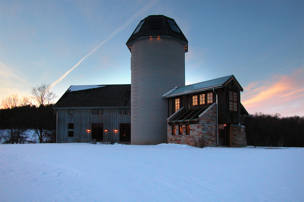 Example of a cottage exterior home design in Other