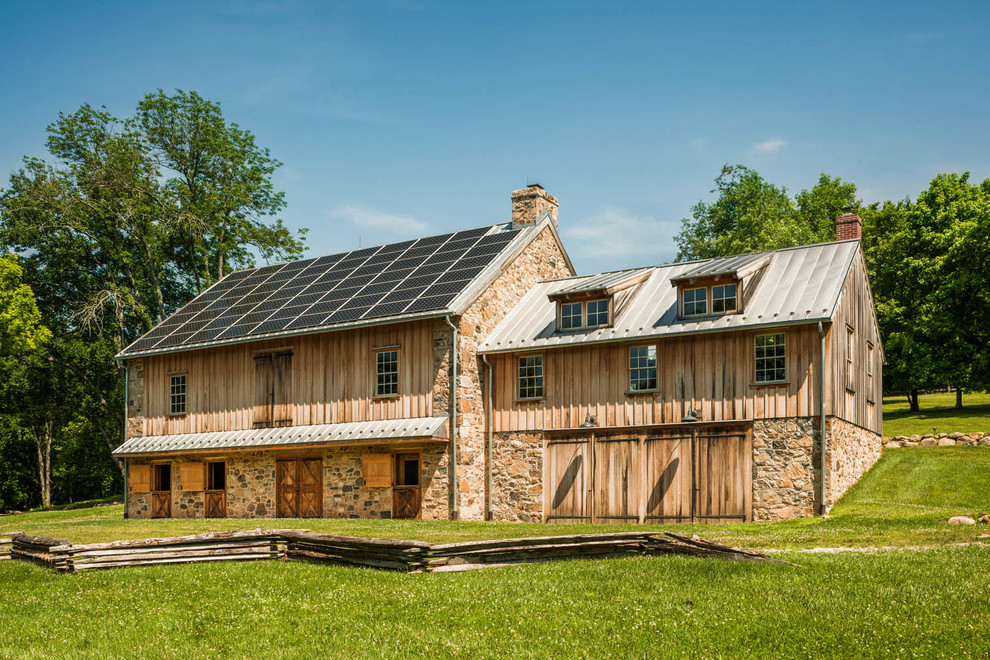 Modelo de fachada de estilo de casa de campo de dos plantas con revestimiento de madera y tejado a dos aguas