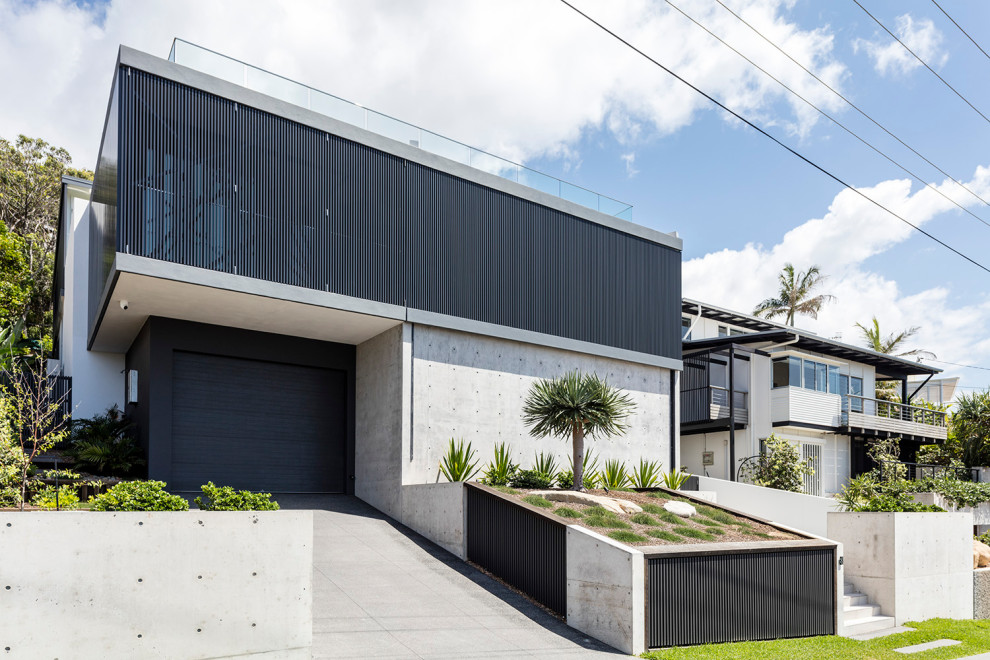 Contemporary exterior home idea in Sunshine Coast