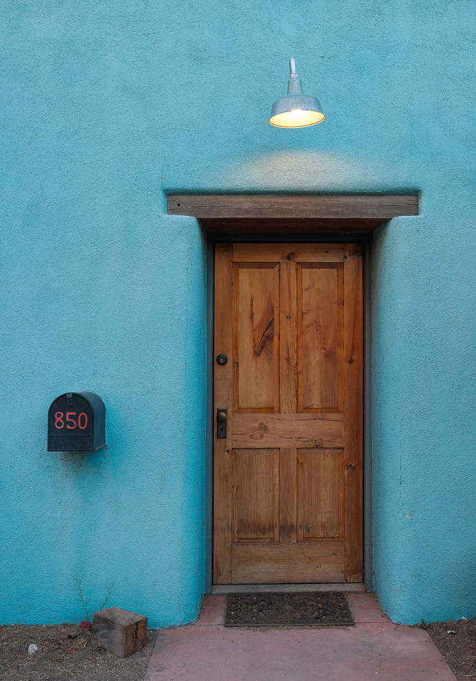 Kleines, Einstöckiges Mediterranes Einfamilienhaus mit Lehmfassade, blauer Fassadenfarbe und Misch-Dachdeckung in Sonstige