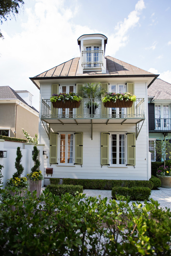 Design ideas for a traditional house exterior in Charleston.
