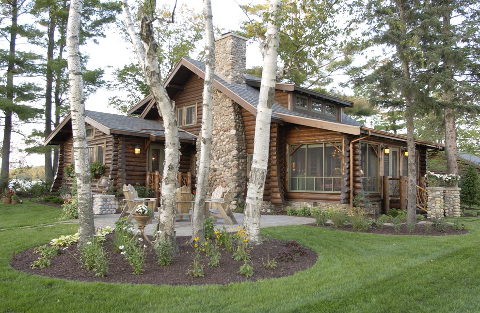Inspiration for a rustic brown one-story wood gable roof remodel in Minneapolis