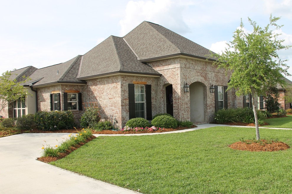 Bayou Lafourche Dr. Traditional Exterior New Orleans by Pelican