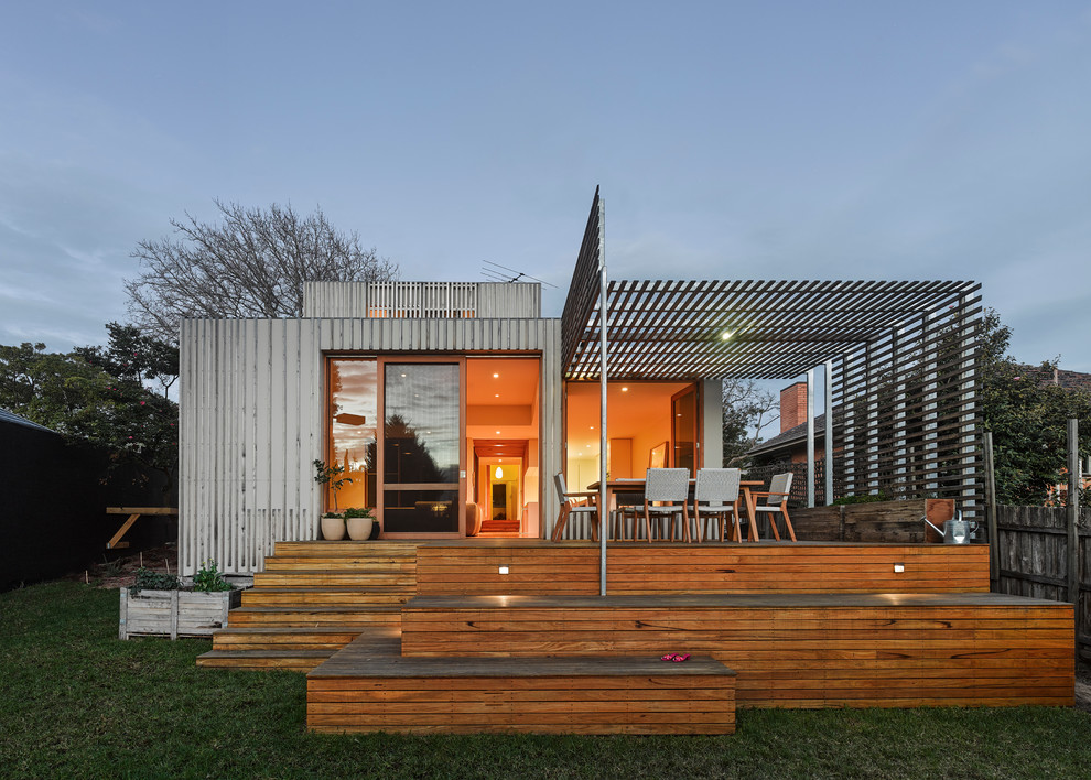 Contemporary house exterior in Melbourne with metal cladding and a flat roof.