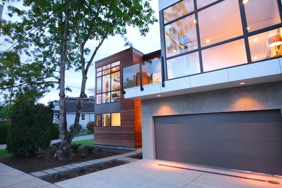 Inspiration for a contemporary two floor house exterior in Vancouver.