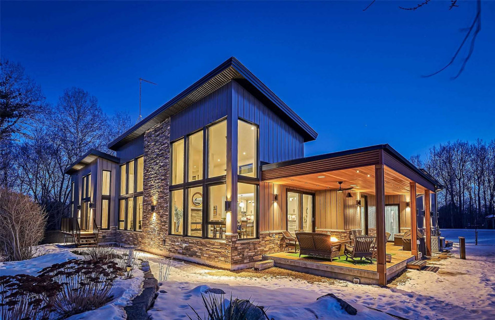 Example of a transitional exterior home design in Toronto