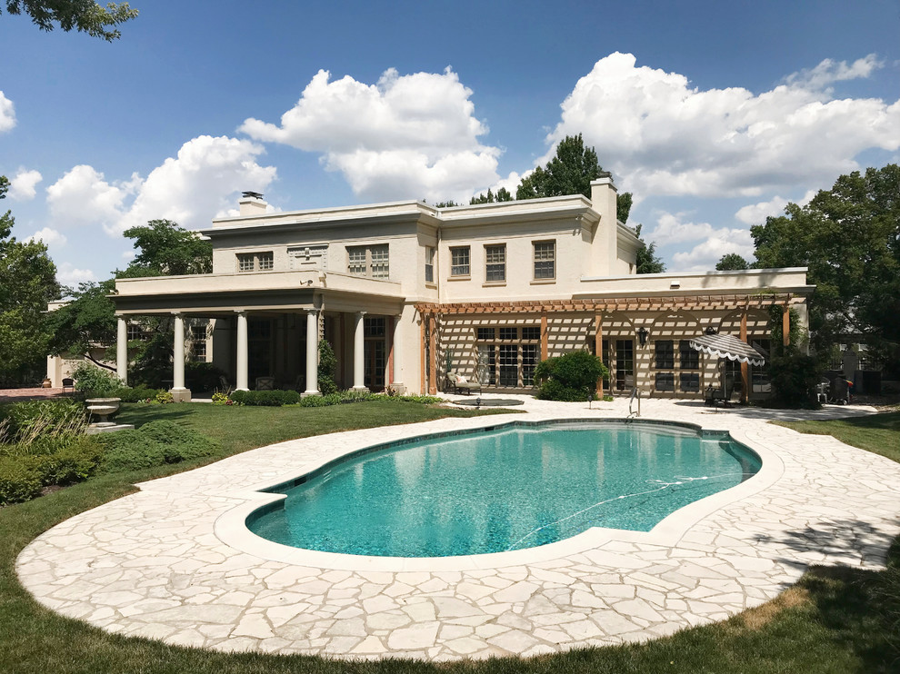 Beautiful Kansas Home with Pergola, Paver Patio, and Pool Fachada