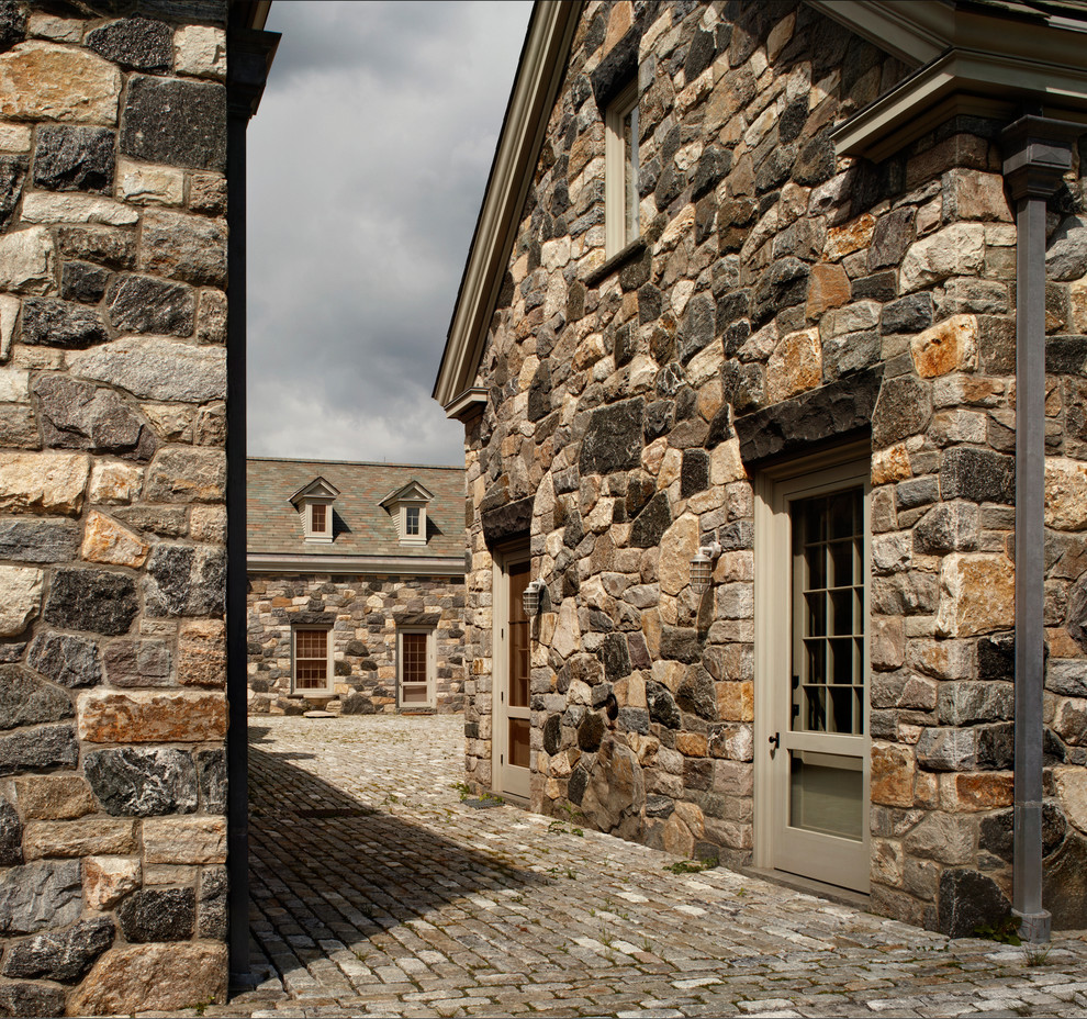 Traditional house exterior in Bridgeport with stone cladding.
