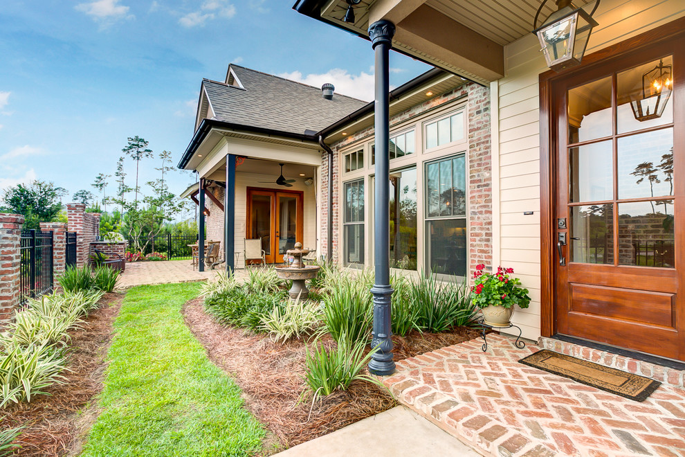 Bedico Creek garden home Craftsman Exterior New Orleans by