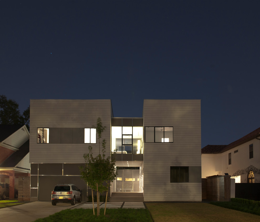 Свежая идея для дизайна: двухэтажный дом среднего размера в современном стиле - отличное фото интерьера