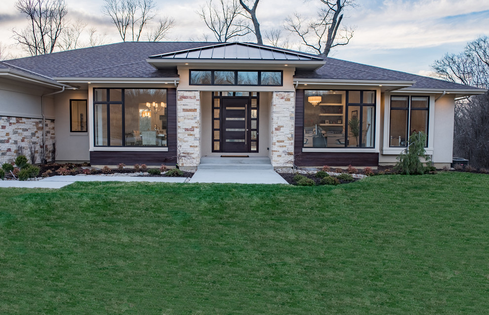 Inspiration for a medium sized and beige modern bungalow detached house in Cincinnati with stone cladding, a hip roof and a mixed material roof.