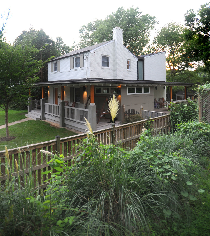 Design ideas for a classic two floor brick house exterior in DC Metro.