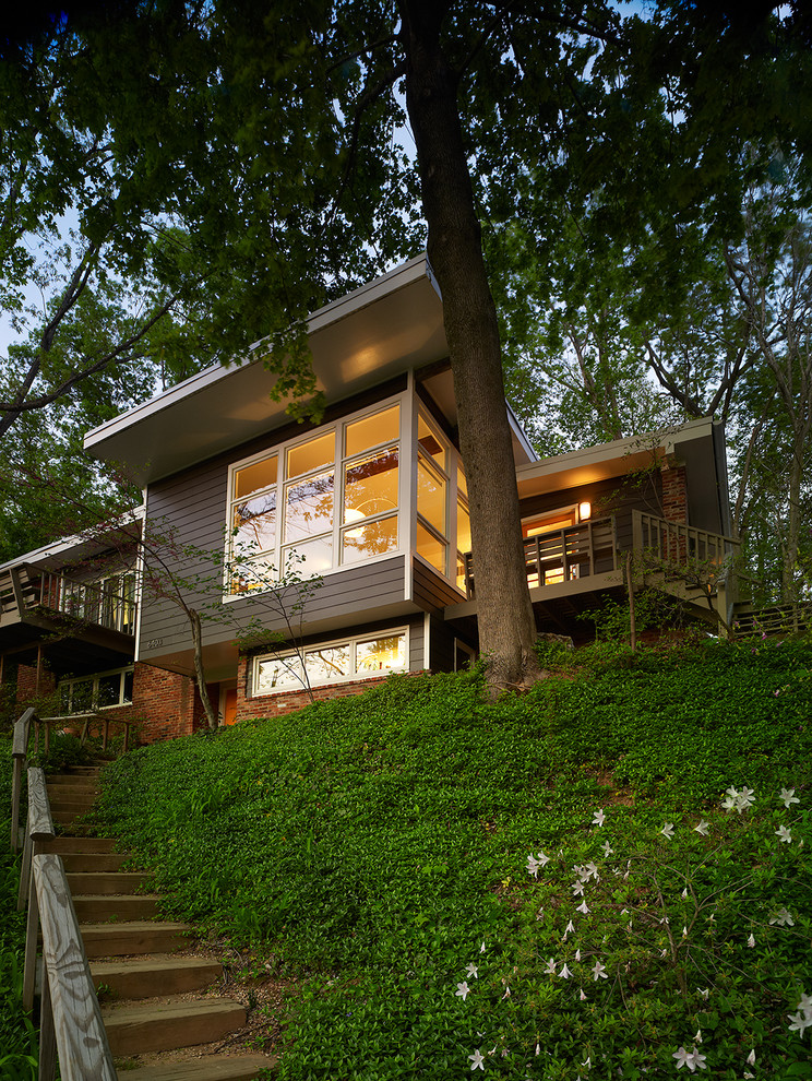 Свежая идея для дизайна: дом в современном стиле с разными уровнями - отличное фото интерьера