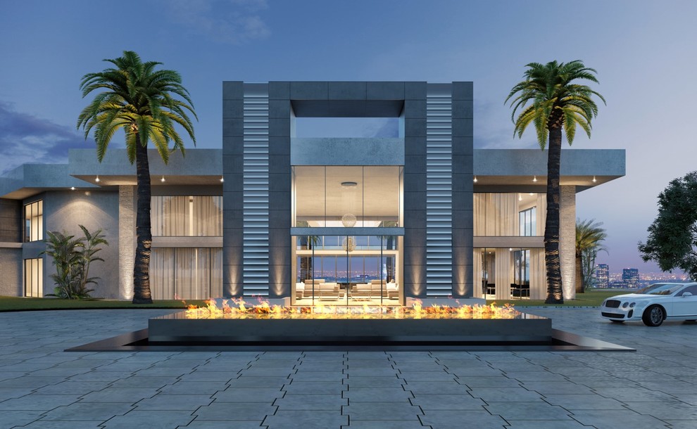 Geräumiges, Dreistöckiges Modernes Haus mit Steinfassade, beiger Fassadenfarbe und Flachdach in Los Angeles