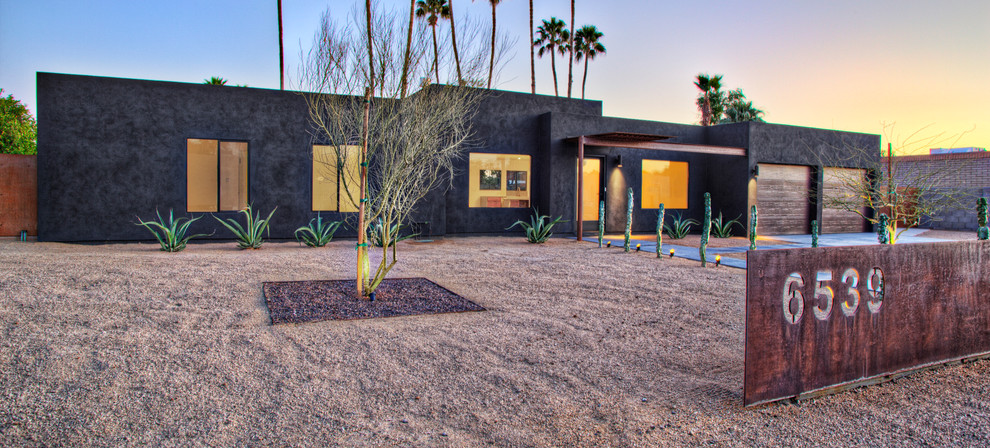 Southwest black exterior home photo in Phoenix
