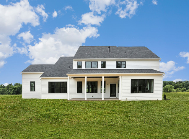 Black windows give this modern farmhouse a stylish look - Country ...