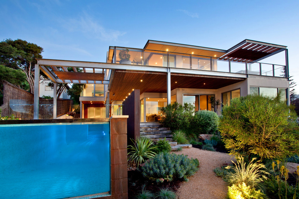 Стильный дизайн: двухэтажный дом в современном стиле с плоской крышей - последний тренд