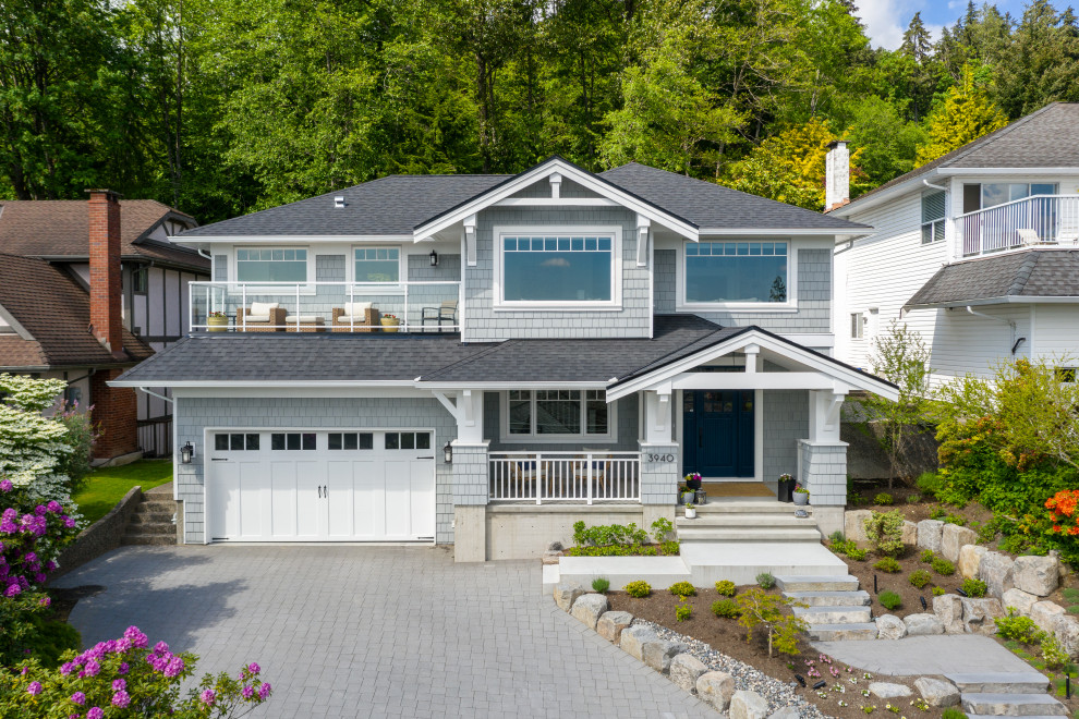 Design ideas for a gey and large classic two floor front detached house in Vancouver with a pitched roof, a shingle roof, a grey roof and shingles.