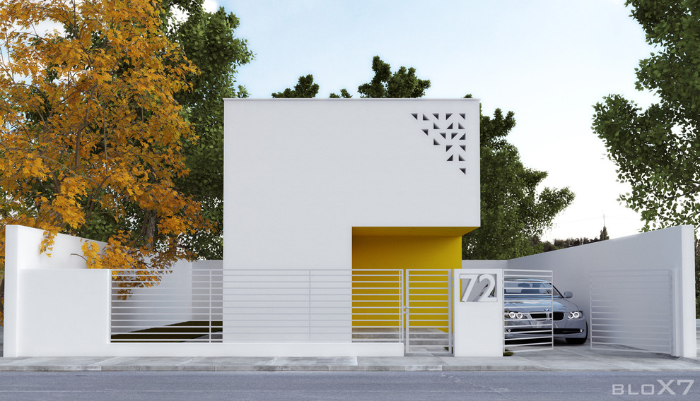 Kleines, Zweistöckiges Modernes Haus mit Betonfassade und weißer Fassadenfarbe in Sonstige