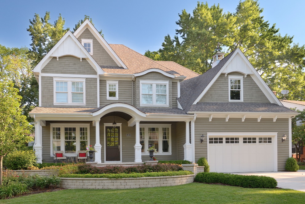 Inspiration for a timeless gray two-story wood exterior home remodel in Chicago