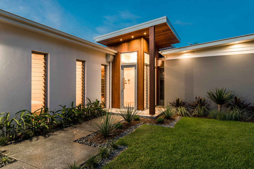 This is an example of a world-inspired house exterior in Gold Coast - Tweed.