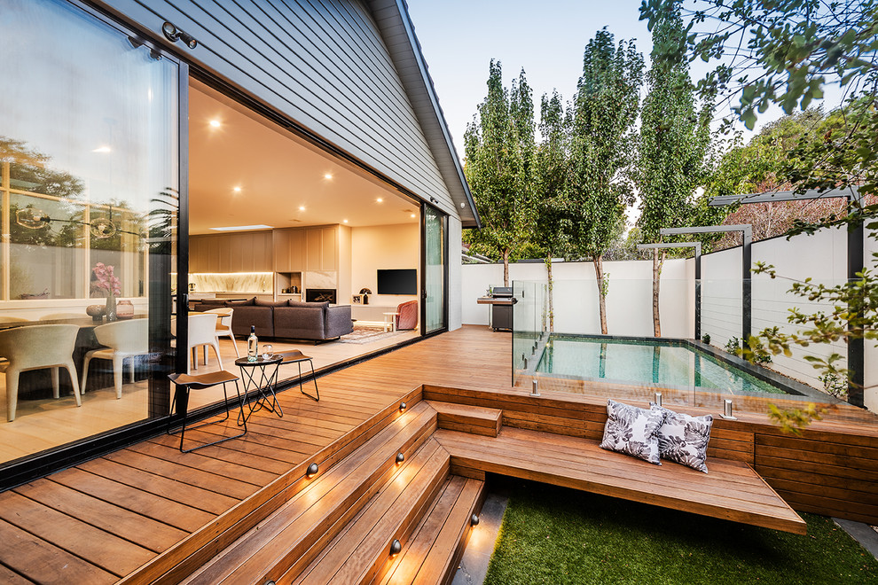 Example of a mid-sized trendy one-story wood house exterior design in Melbourne