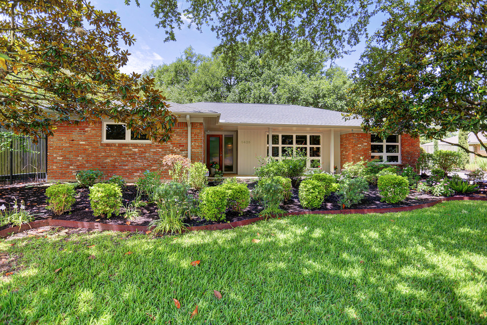 Braes Heights Renovation of mid60's home Midcentury Exterior