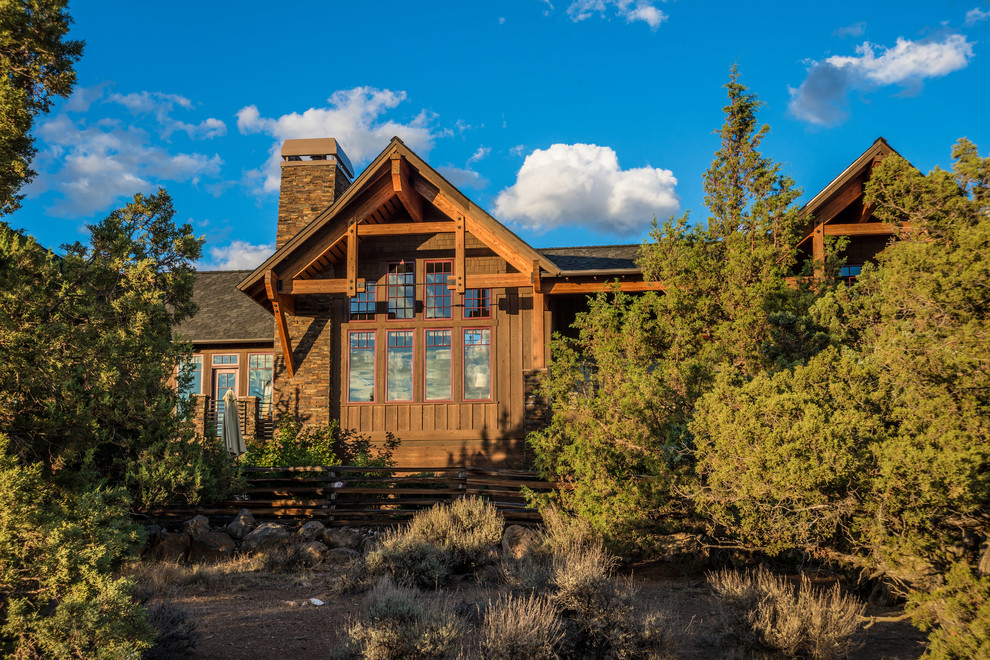 Brasada Ranch home rear exterior showing living room windows - Rustic ...