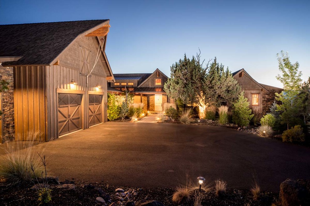 Large rustic brown one-story mixed siding gable roof idea in Other