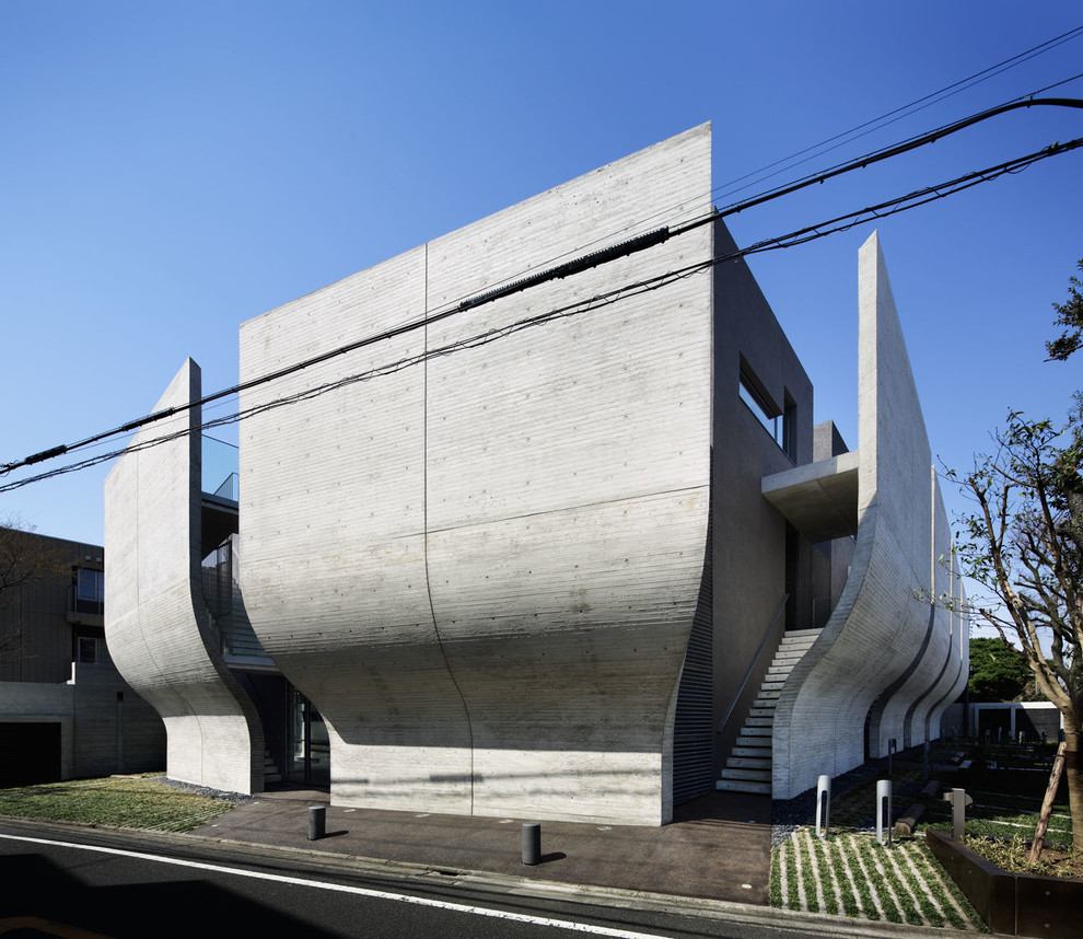 Design ideas for a gey concrete house exterior in Tokyo Suburbs.