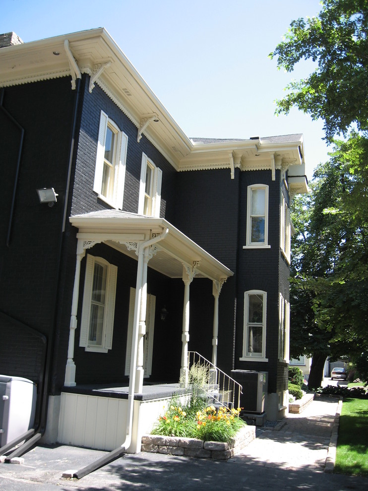 Brick house exterior repaint Kitchener, Ontario Traditional