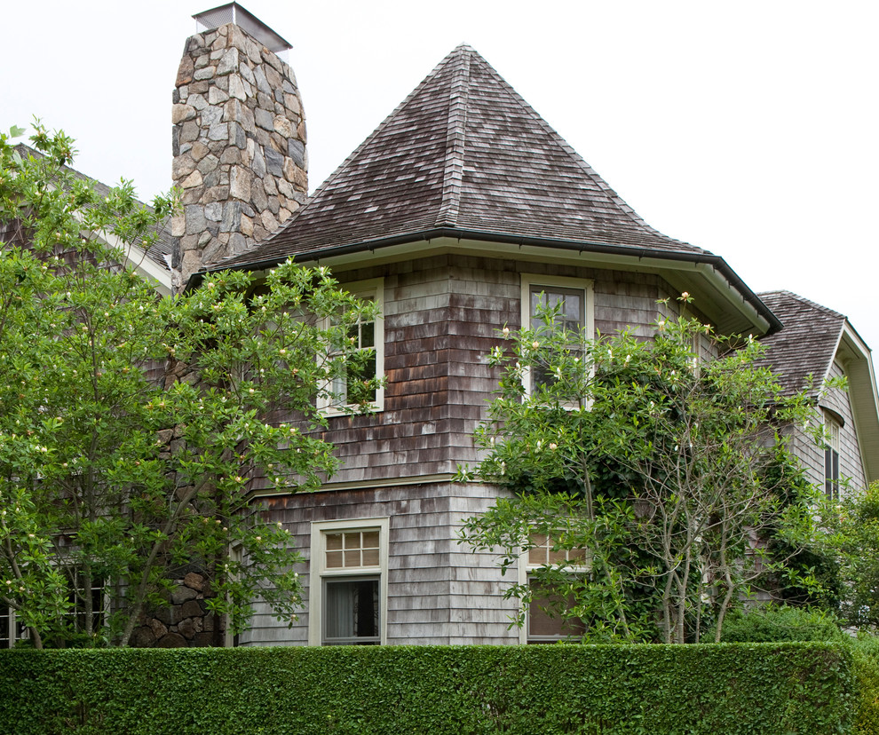 This is an example of a traditional house exterior in New York with wood cladding.
