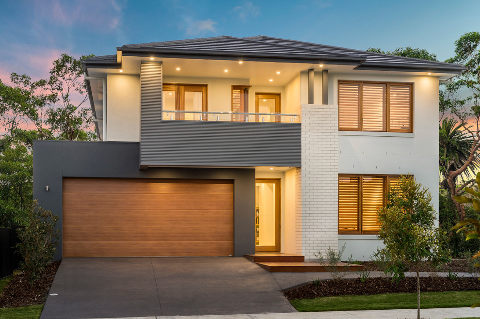 Large contemporary white two-story mixed siding exterior home idea in Brisbane