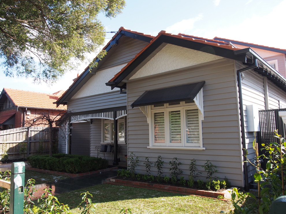 Example of a classic exterior home design in Melbourne