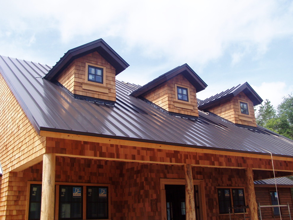 Brown Roofed House Rustic Exterior Atlanta by Streamline