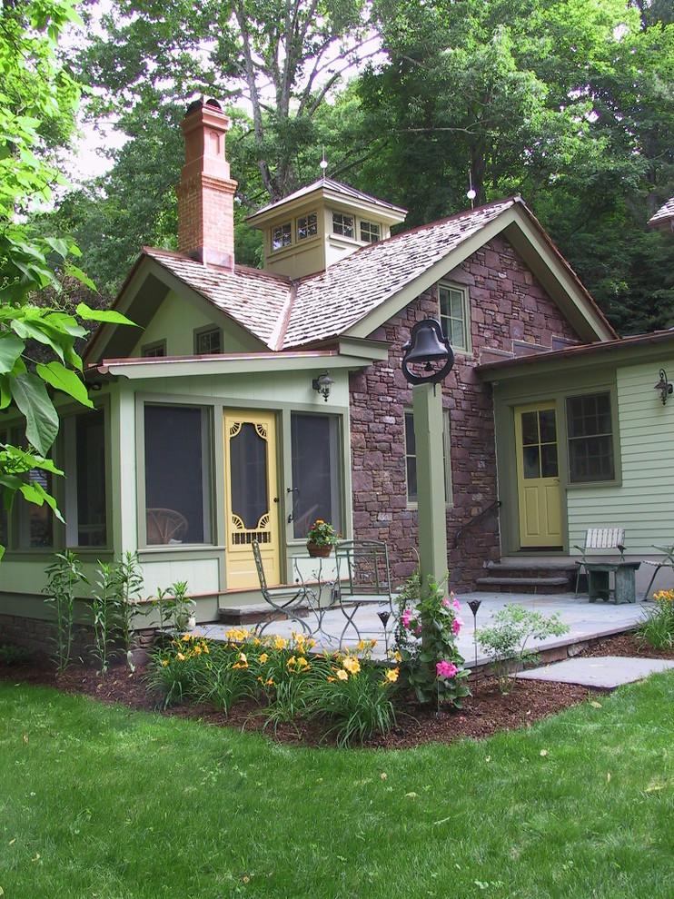 Inspiration for a cottage stone exterior home remodel in New York