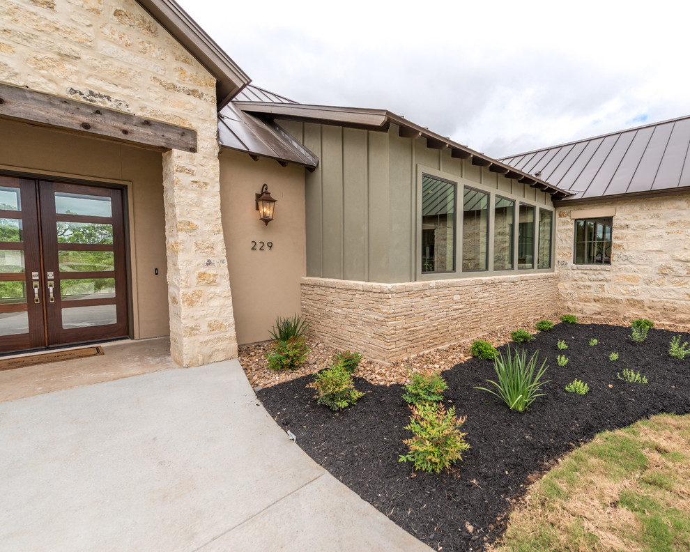 This is an example of a farmhouse house exterior in Austin.