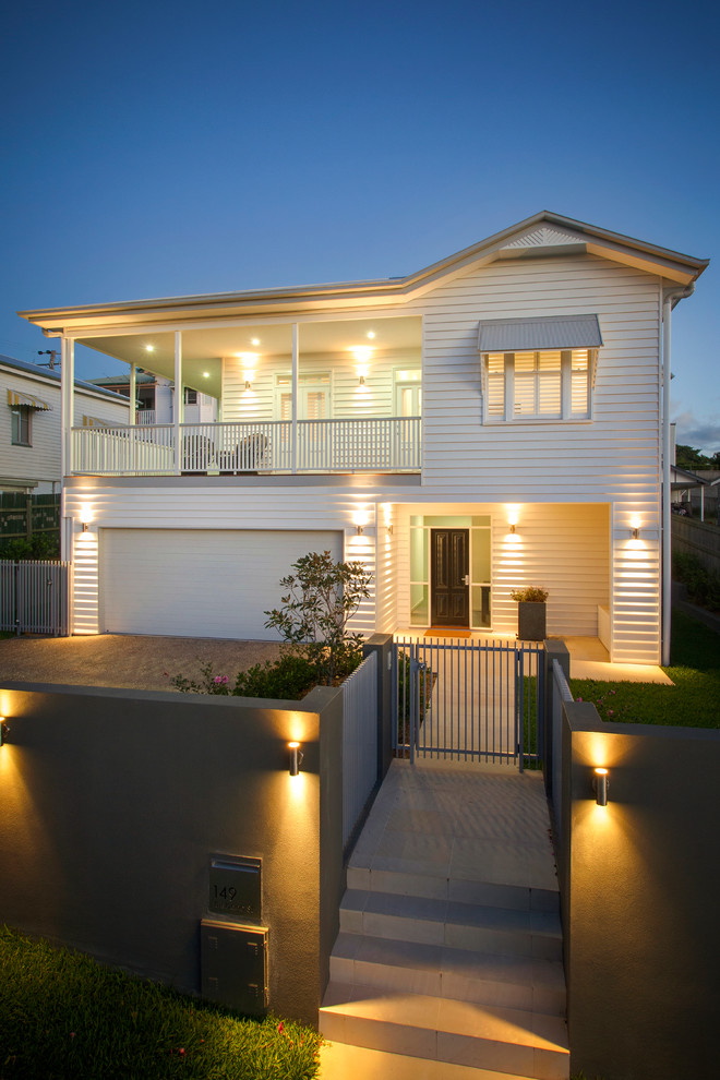 Inspiration for a white classic two floor house exterior in Brisbane.