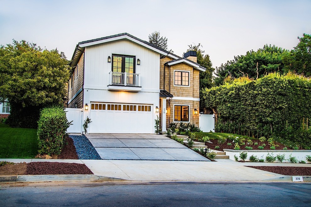 Example of a large transitional white two-story mixed siding exterior home design in Los Angeles